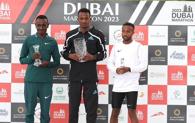 From left to right: Deresa Gelete Ulfata, Abdisa Tola Adera  and Haymanot Alew Engdayehu celebrate on the podium. Getty