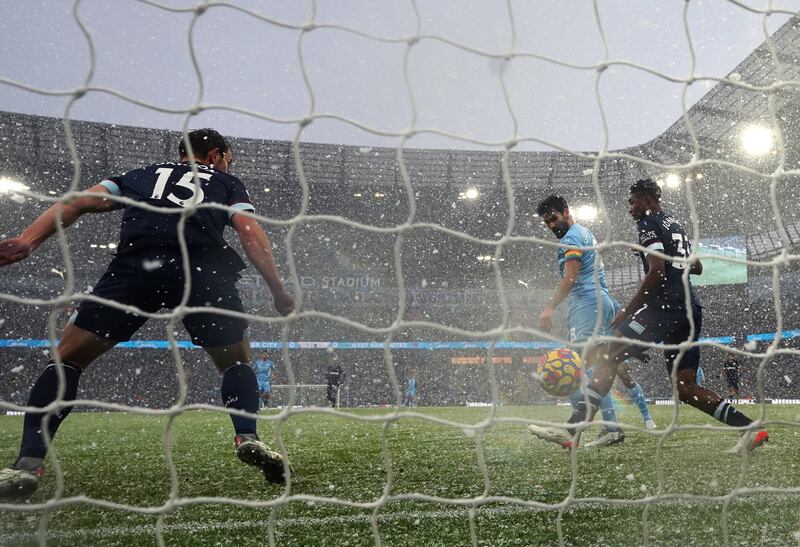 Ilkay Gundogan shoots to score for Manchester City against West Ham. AFP