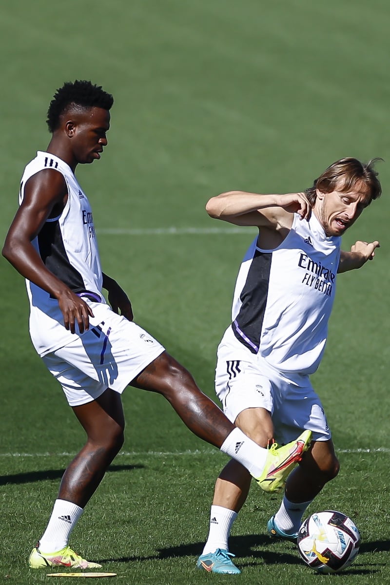 Vinicius Jr and Luka Modric attend a training session in Madrid. EPA