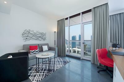 The living room of a premium room at the Tryp by Wyndham Barsha Heights in Dubai. Tryp by Wyndham