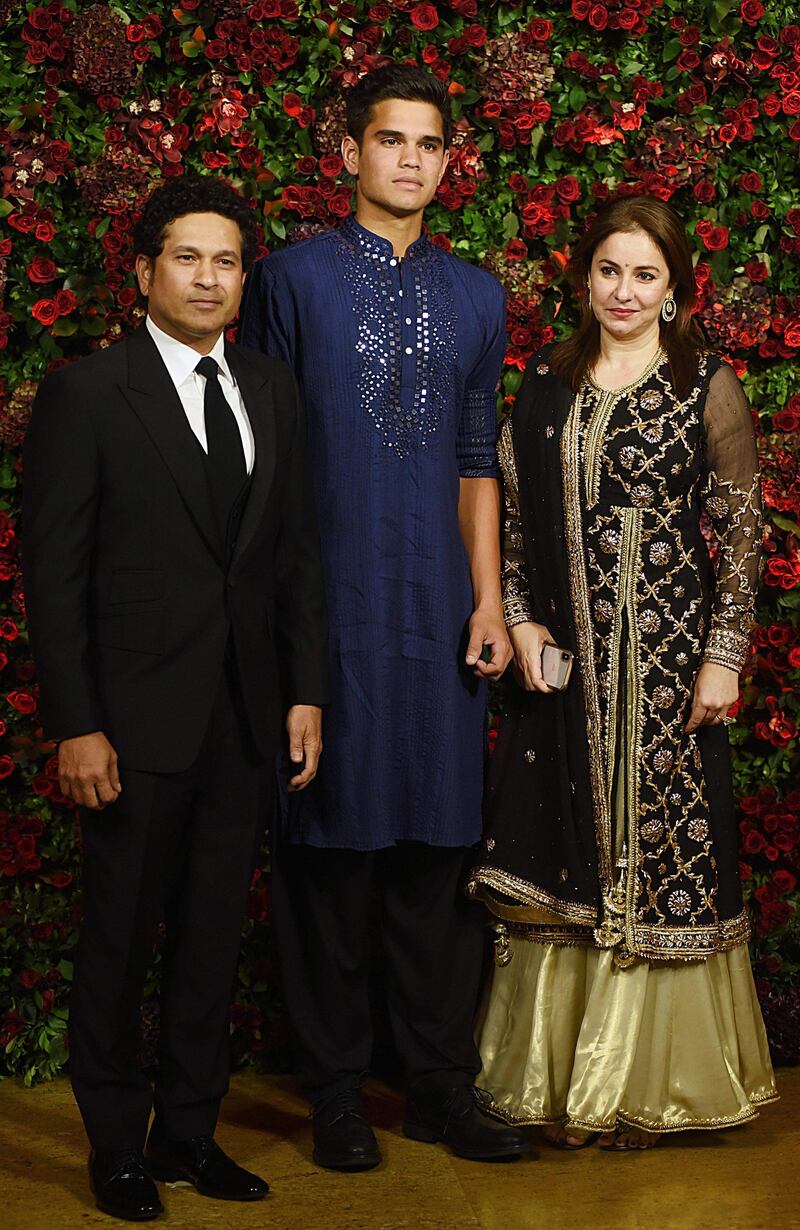 Sachin Tendulkar with his son Arjun and wife Anjali. AFP