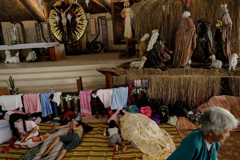 Residents affected by the Taal Volcano eruption rest in Padre Pio Shrine, Santo Tomas, Batangas, Philippines.  Reuters