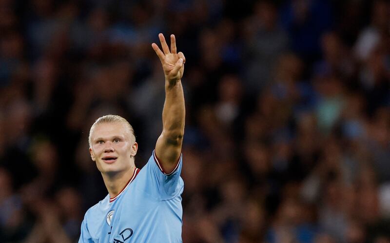 City's Erling  Haaland celebrates completing his hat-trick. Reuters