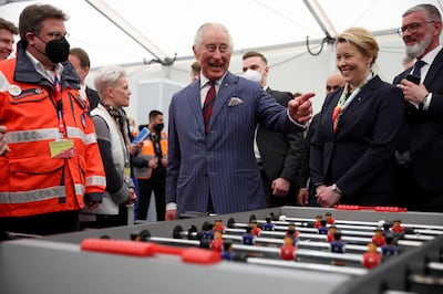 King Charles had a game of table football on a visit to a Ukrainian reception centre. Getty 