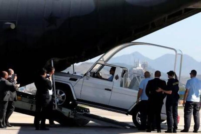 The Popemobile arrives at Galeao air base ahead of World Youth Day in Rio De Janeiro.