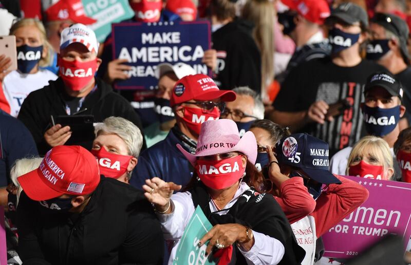 Supporters of US President Donald Trump attend a rally at Toledo Express Airport in Swanton, Ohio, September 21, 2020. AFP
