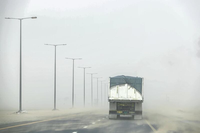 RAS AL KHAIMAH, UNITED ARAB EMIRATES. 09 AUGUST 2018. Extreme winds created sand storm conditions in the Emirates. Low visibility forced drivers to take extra caution while commuting. (Photo: Antonie Robertson/The National) Journalist: None. Section: National.