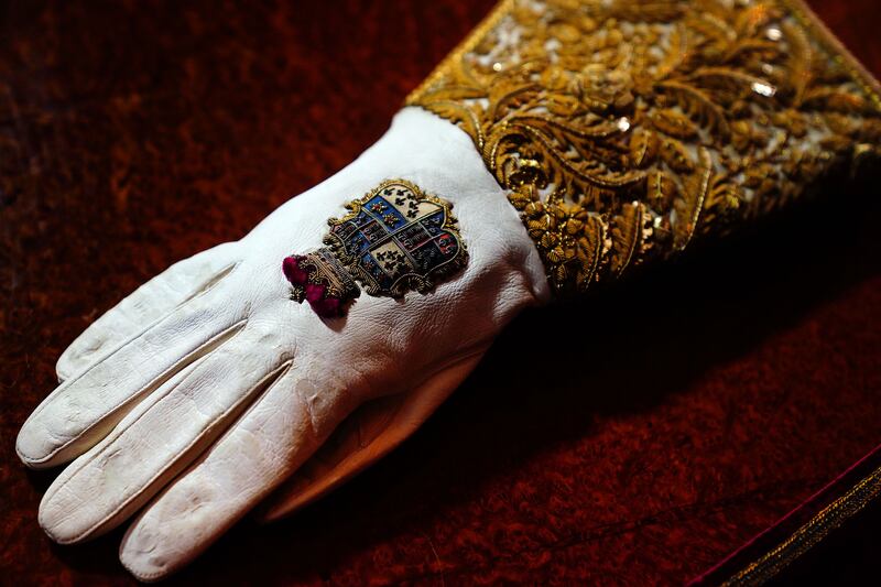 The Coronation Gauntlet, a glove symbolising royal authority, features detailed embroidery of national emblems