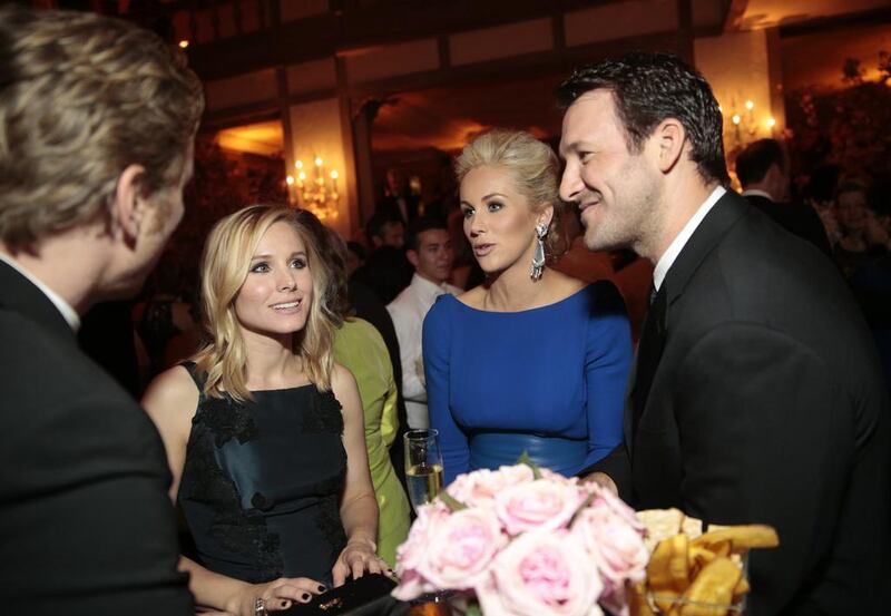 Kristen Bell and Candice Crawford, in blue, attend the dinner afterparty. Andrew Harrer / Bloomberg