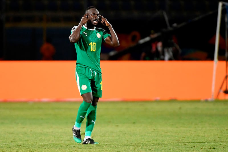 Senegal's forward Sadio Mane celebrates after scoring a goal during the 2019 Africa Cup of Nations (CAN) Group C football match between Kenya and Senegal at the 30 June Stadium in the Egyptian capital Cairo on July 1, 2019.  / AFP / Khaled DESOUKI

