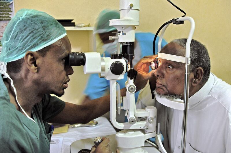 A Somali patient has his eyes tested before receiving a free cataract surgery at Al Nuur eye Hospital in Mogadishu, on February 16, 2015. More than 800 patients annualy receive free cataract surgery at Al Nuur Eye Hospital as part of a drive to improve the eyesight of members of poorer communities. AFP PHOTO/Mohamed Abdiwahab / AFP PHOTO / Mohamed Abdiwahab