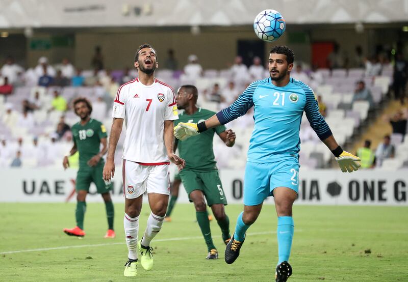 Al Ain, United Arab Emirates - August 29th, 2017: UAE's Ali Mabkhout and Saudi's Abdullah Almuaiouf during the World Cup qualifying game between UAE v Saudi Arabia. Tuesday, August 29th, 2017 at Hazza Bin Zayed Stadium, Al Ain. Chris Whiteoak / The National