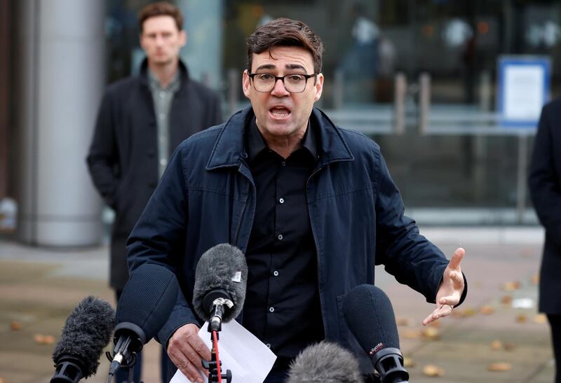 Andy Burnham, mayor of Manchester, holds a news conference on Tuesday. Mr Burnham has been seeking more financial support for workers and businesses affected by the Covid-19 restrictions in his region of almost 3 million people. Reuters