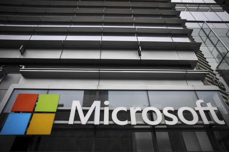 (FILES) In this file photo the Microsoft logo is displayed outside the Microsoft Technology Center near Times Square, June 4, 2018 in New York City.  Microsoft on October 20, 2020 said its Azure cloud computing service is taking to outer space, and will deliver datacenter power to remote spots on Earth in the process. The US technology titan announced partnerships with satellite operators including SpaceX, founded by Elon Musk, as part an "ecosystem" to serve networking needs in orbit as well as beam high-speed internet connections to modular datacenters that can be deployed almost anywhere.
 / AFP / GETTY IMAGES NORTH AMERICA / Drew Angerer
