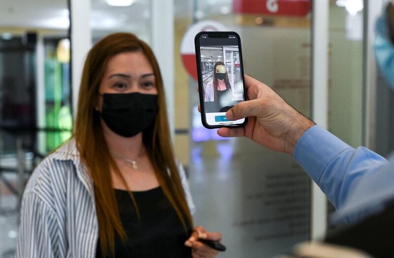 Face Scanning Detection-AD  Instant detection appears on the hand held device with the new EDE scanner at Al Wahda Mall in Abu Dhabi on June 28, 2021. Khushnum Bhandari/ The National
Reporter: N/A News