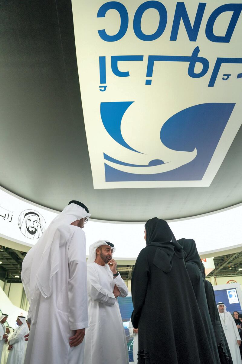 ABU DHABI, UNITED ARAB EMIRATES - November 14, 2018: HH Sheikh Mohamed bin Zayed Al Nahyan, Crown Prince of Abu Dhabi and Deputy Supreme Commander of the UAE Armed Forces (C), visits the ADNOC stand while touring the Abu Dhabi International Petroleum Exhibition and Conference (ADIPEC), at the Abu Dhabi National Exhibition Centre. Seen with HE Dr Sultan Ahmed Al Jaber, UAE Minister of State, Chairman of Masdar and CEO of ADNOC Group (L).

( Mohamed Al Hammadi / Ministry of Presidential Affairs )
---