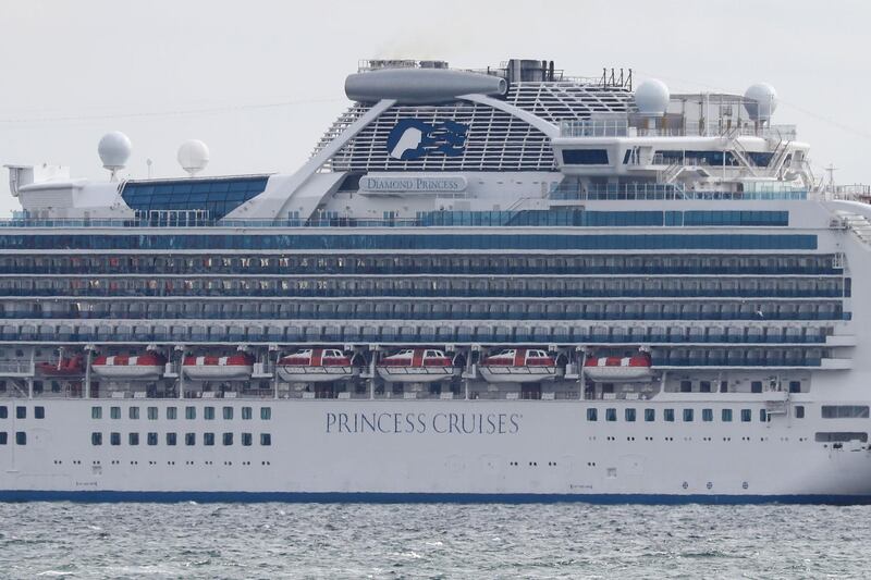 The upper decks of the Diamond Princess cruise ship with over 3,000 people look empty as the ship sits anchored in quarantine off the port of Yokohama, a day after it arrived with passengers feeling ill.  AFP