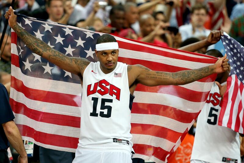 LONDON, ENGLAND - AUGUST 12: Carmelo Anthony #15 of the United States celebrates winning the Men's Basketball gold medal game between the United States and Spain on Day 16 of the London 2012 Olympics Games at North Greenwich Arena on August 12, 2012 in London, England. The United States won the match 107-100.  (Photo by Christian Petersen/Getty Images)