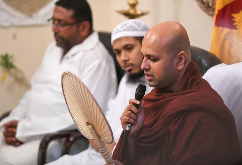 Abu Dhabi, United Arab Emirates - Venerable Rammuthugala Buddhawansa Thero Buddhist monk prays for the people who lost their lives at the heinous terrorist attacks, which took place on Easter in Sri Lanka at the Sri Lankan Embassy in Abu Dhabi. Khushnum Bhandari for The National
