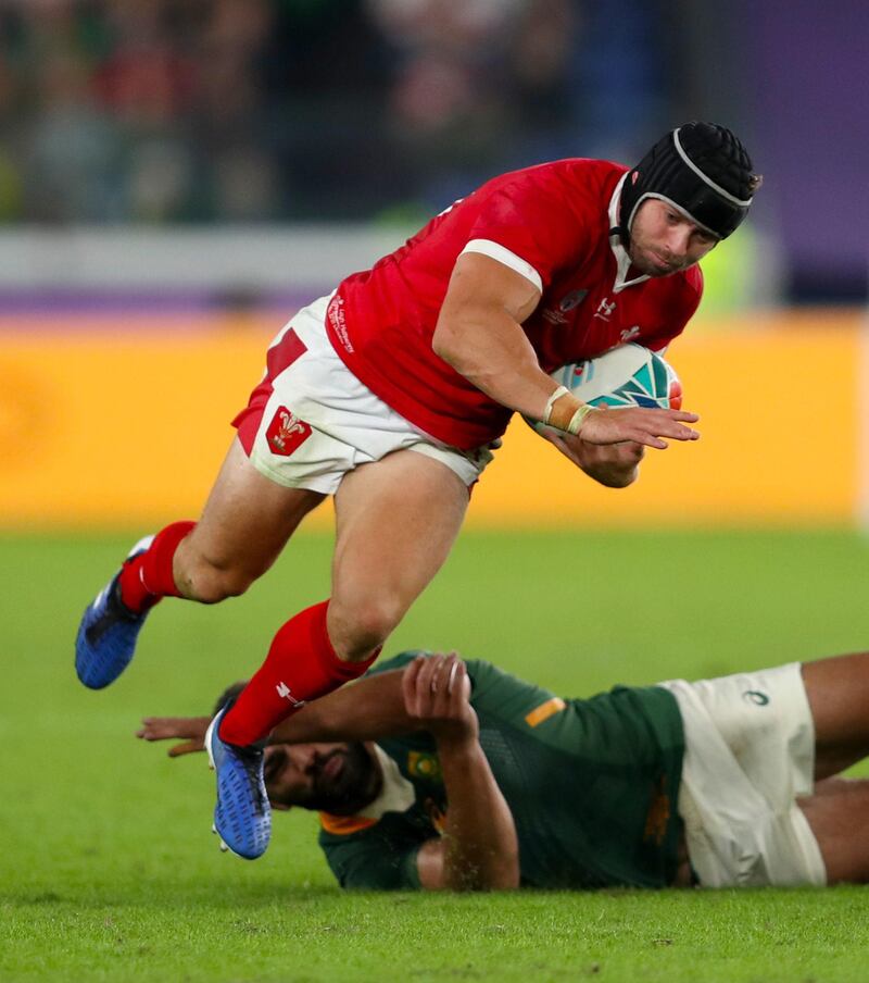 Wales' Leigh Halfpenny (left) is tackled by South Africa's Damian de Allende during the 2019 Rugby World Cup Semi Final match at International Stadium Yokohama. PA Photo