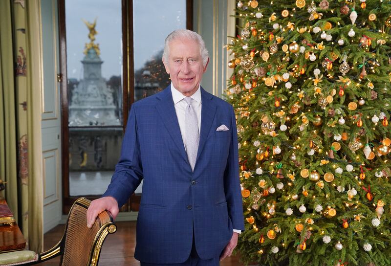 King Charles III during the recording of his Christmas message at Buckingham Palace. PA
