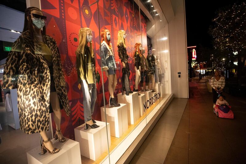 Mannequins adorned with protective face masks are pictured in a window at The Grove shopping center during a partial lockdown amid the outbreak of the coronavirus disease in Los Angeles, California, US. Reuters