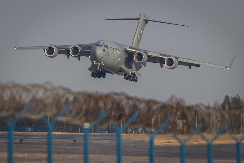 A C-17 Globemaster cargo plane lands at Rzeszow-Jasionka Airport, in south-eastern Poland, to bolster Nato's presence near Ukraine. AFP