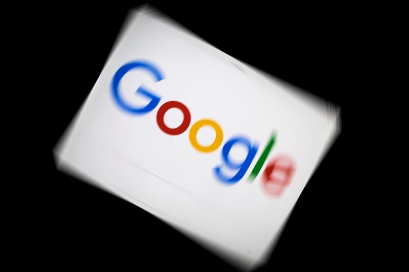 (FILES) In this file photo taken on February 04, 2019 a picture taken on February 5, 2019 shows the Google logo displayed on a tablet in Paris. Google parent Alphabet reported a rare drop in revenue and profit on July 30, 2020, in a quarterly update that nonetheless topped market expectations. / AFP / Lionel BONAVENTURE
