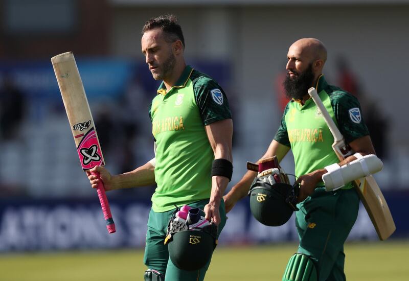 Cricket - ICC Cricket World Cup - Sri Lanka v South Africa - Emirates Riverside, Chester-Le-Street, Britain - June 28, 2019   South Africa's Faf du Plessis and Hashim Amla walk off after winning the match   Action Images via Reuters/Lee Smith