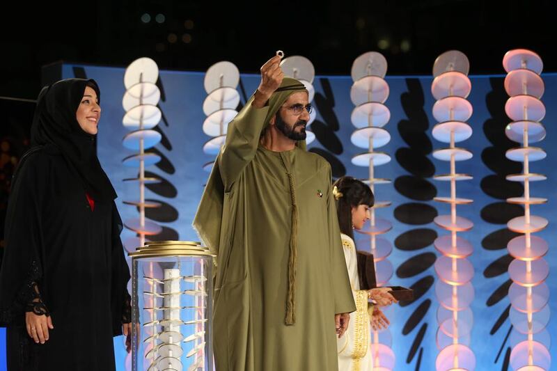 Sheikh Mohammed bin Rashid, Vice President and Ruler of Dubai, reveals the new logo. Anna Nielsen / The National