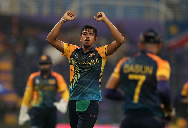 Sri Lanka bowler Maheesh Theekshana celebrates after taking the wicket of Namibia's Zane Green during the T20 World Cup match at Zayed Cricket Stadium in Abu Dhabi. Sri Lanka won the match by seven wickets. Chris Whiteoak / The National