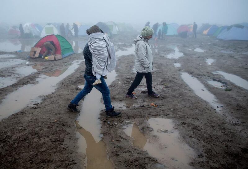 Refugees in a camp at the Greek-Macedonian border near Idomeni. Kay Nietfeld /  EPA