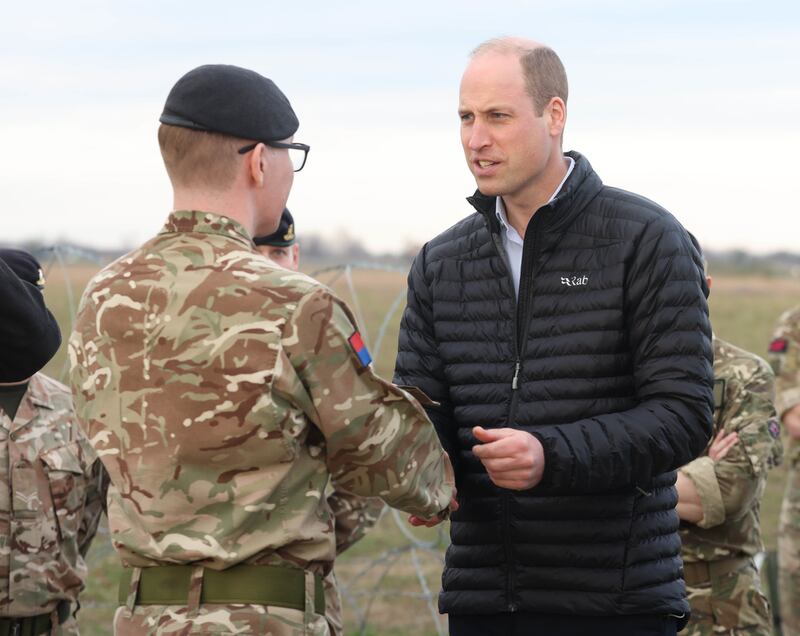 Prince William meets members of the British Armed Forces in Rzeszow to hear about the work the troops have been doing with Polish soldiers. Getty 