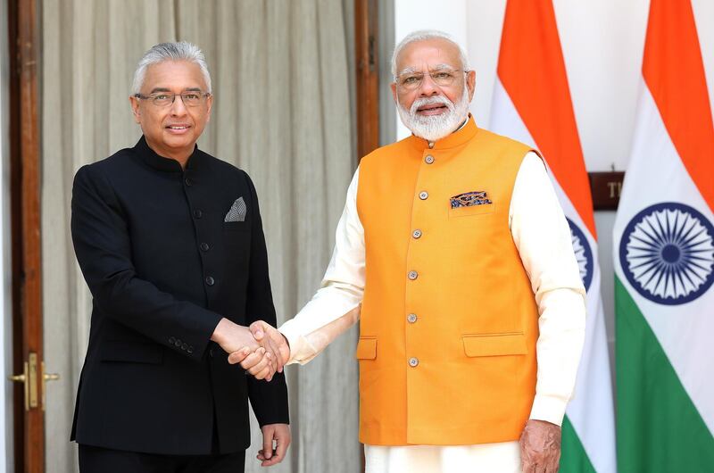 epa07614251 Indian prime minister Narendra Modi and Mauritius's prime minister Pravind Jugnauth shake hands prior to a bilateral meeting with the member countries of Bay of Bengal Initiative for Multi-Sectoral Technical and Economic Cooperation (BIMSTEC) at Hyderabad House in New Delhi, India, 31 May 2019.  EPA/HARISH TYAGI