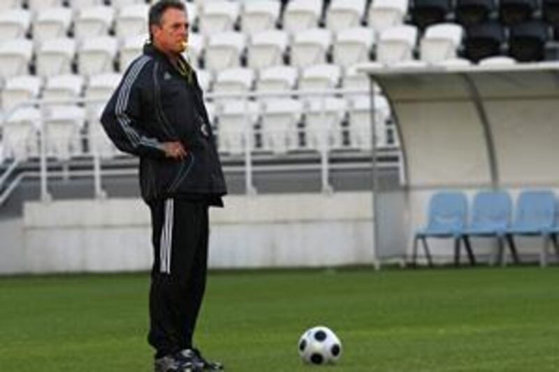 Abel Braga keeps an eye on a Jazira training session.