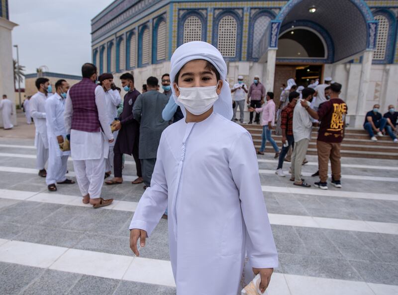 Worshippers after morning prayers in Abu Dhabi. Victor Besa / The National