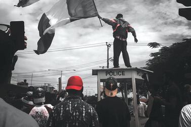 The photograph of Flagboy that went viral in October 2020. Courtesy: Ayodeji Adegoroye