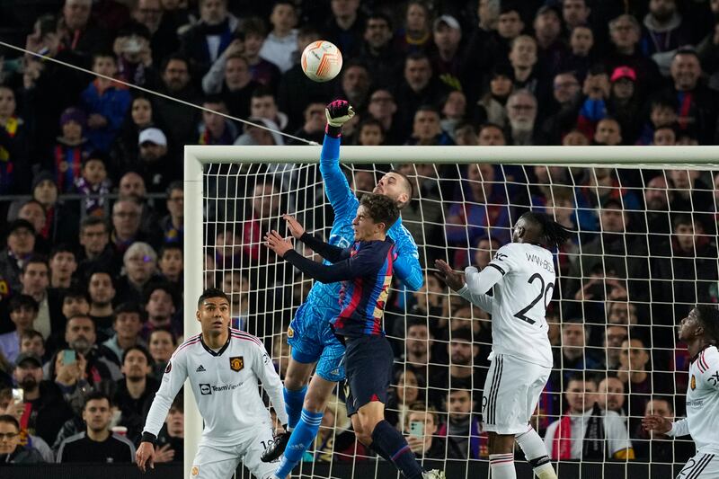 Barca midfielder Gavi in action against United goalkeeper David De Gea. EPA