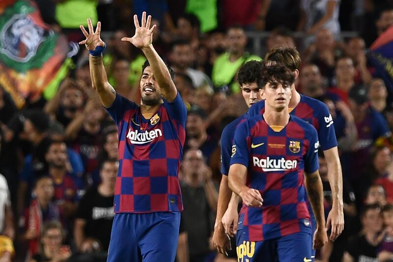 Suarez salutes the Barcelona crowd after netting the winner. AFP