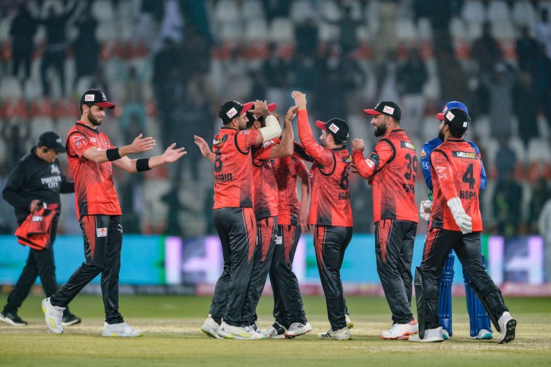 Lahore Qalandars celebrate after winning the opening game of the 2023 Pakistan Super League against Multan Sultans at the Multan Cricket Stadium on Monday, February 13, 2023. AFP