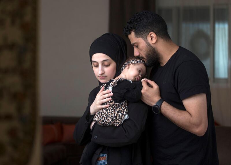 Sharjah, United  Arab Emirates -Mohammed and Nihal with baby Malak who has been diagnosed with a rate muscle wasting disease.  The family need 8 Million to be able to provide Malak with the life saving medicines at their home in Sharjah.  Leslie Pableo for The National for Gillian's story