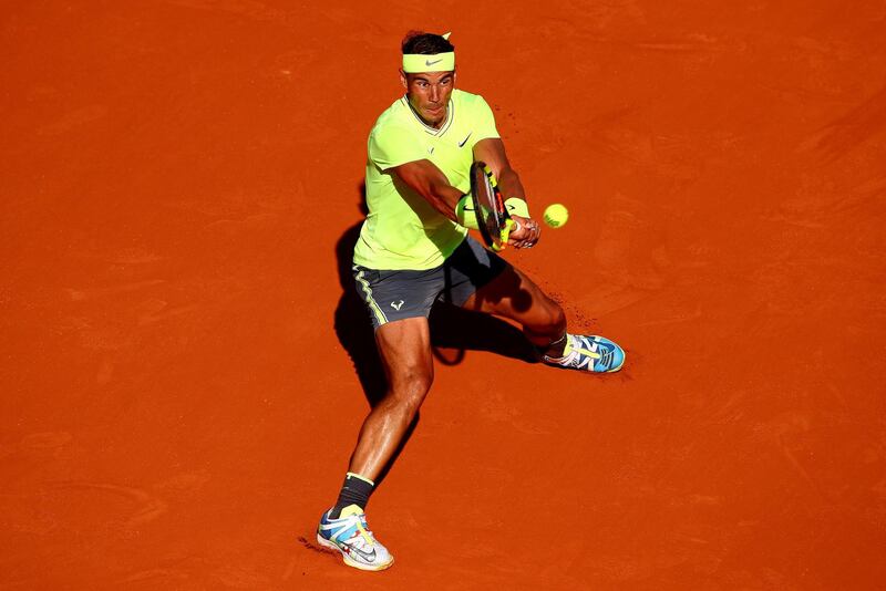 Nadal shows his focus as he plays a backhand. Getty