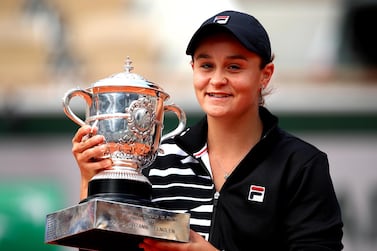 Women's French Open champion Ashleigh Barty celebrates with the French Open trophy. Getty