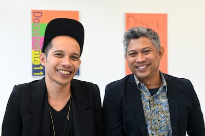 22 February 2019, Hessen, Kassel: The two representatives of the Indonesian artists' collective Ruangrupa, Farid Rakun (l) and Ade Darmawan, who will curate documenta 15, smile at the photographer. Photo: Uwe Zucchi/dpa (Photo by Uwe Zucchi/picture alliance via Getty Images)