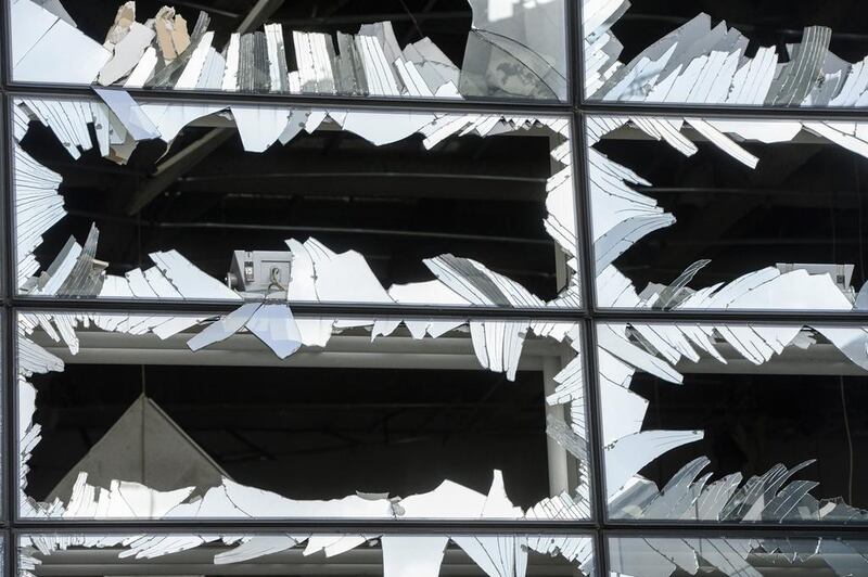 Blown out windows at Zaventem Airport terminal in Brussels. Belgian authorities were searching on Wednesday for a top suspect in the country’s deadliest attacks in decades, as the European Union’s capital awoke under guard and with limited public transport after scores were killed and injured in bombings on the Brussels airport and a subway station. Frederic Sierakowski / AP Photo
