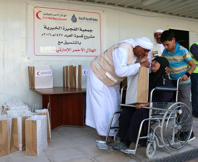 The administration of the UAE-Jordanian camp in Murayjib Al Fuhood is continuing its campaign to distribute Eid clothing to Syrian refugees inside the camp as part of its preparations for Eid Al Adha. Courtesy Wam