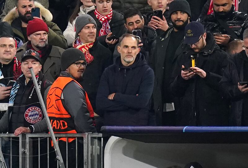 Bayern Munich manager Thomas Tuchel sits in the stands after being sent off. PA