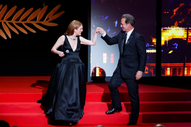 Julianne Moore on stage with Vincent Lindon, jury president of the 75th Cannes Film Festival. Reuters