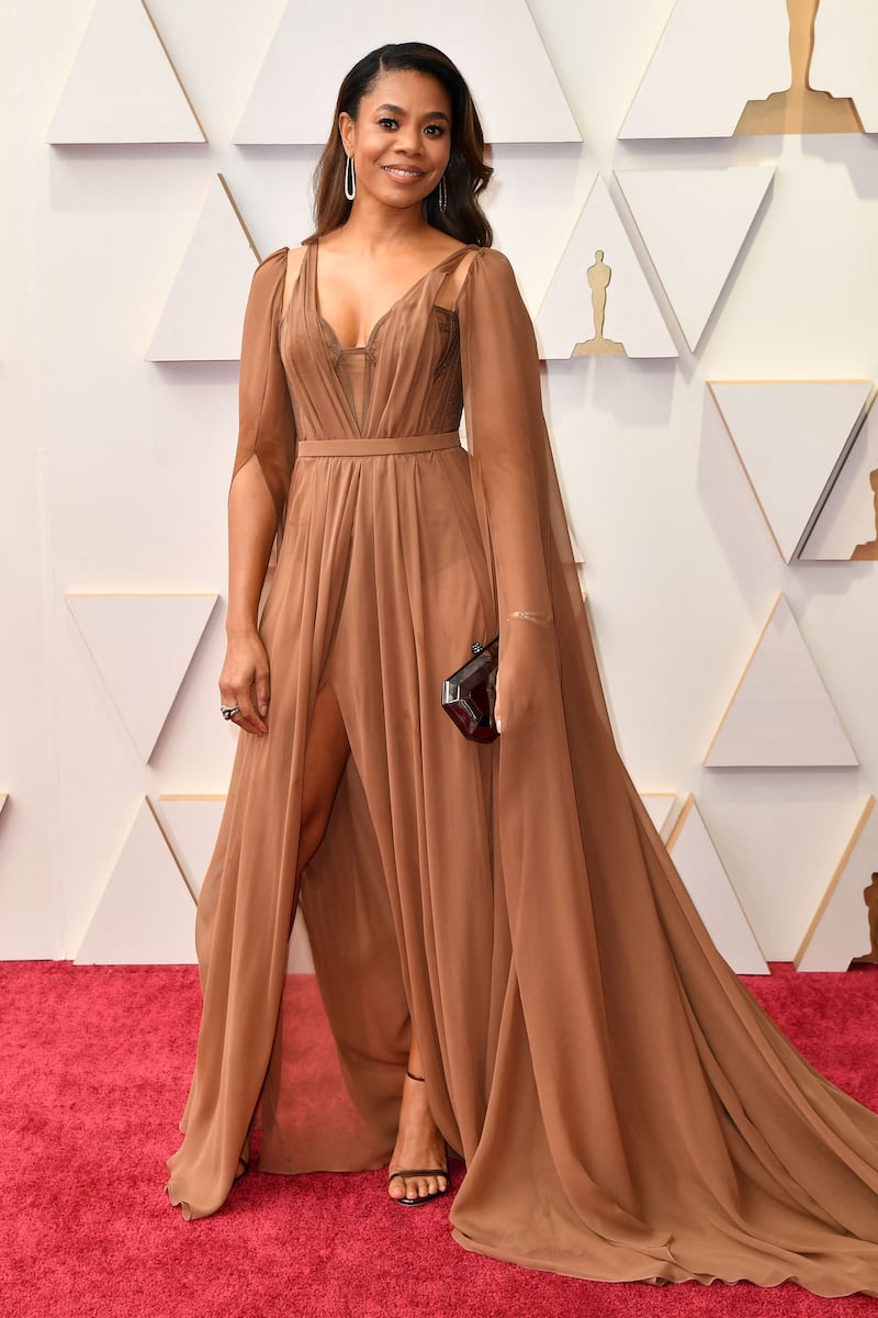 Regina Hall, wearing a dusty-brown gown. AFP