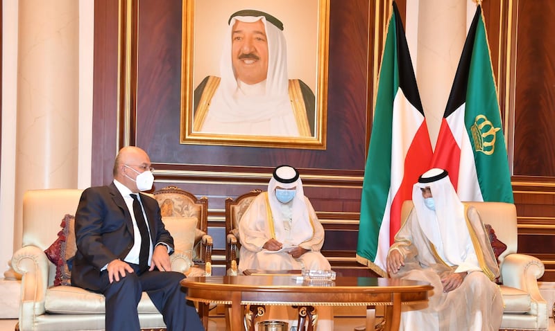 Iraq's President Barham Salih offers condolences to Kuwait's new Emir Sheikh Nawaf Al Sabah on the death of late Emir Sheikh Sabah, in Kuwait City, Kuwait. Kuwait News Agency via Reuters